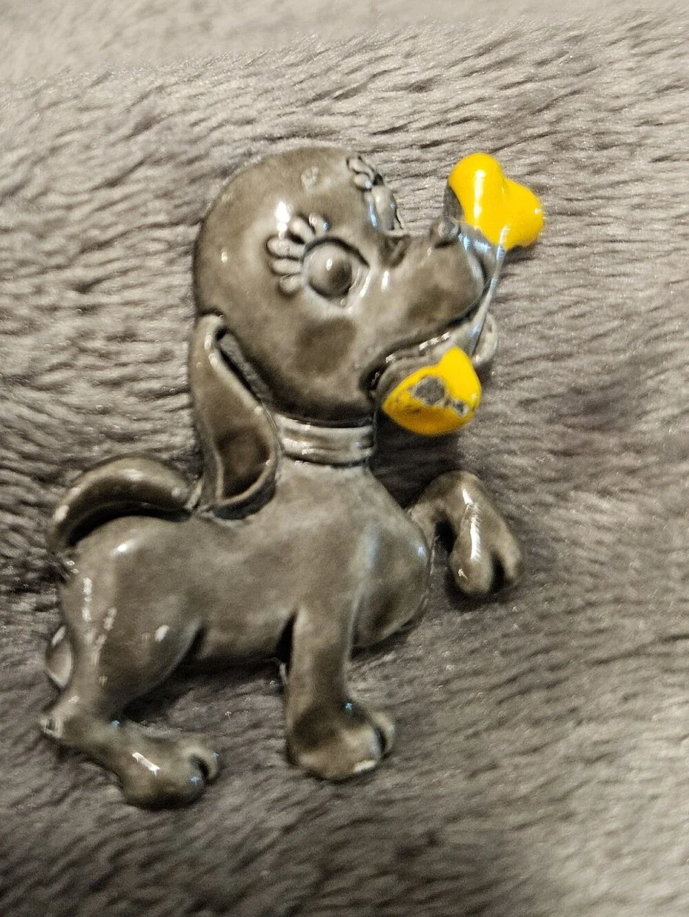 Vintage enamel brooch/pin - gray puppy holding a yellow bone.